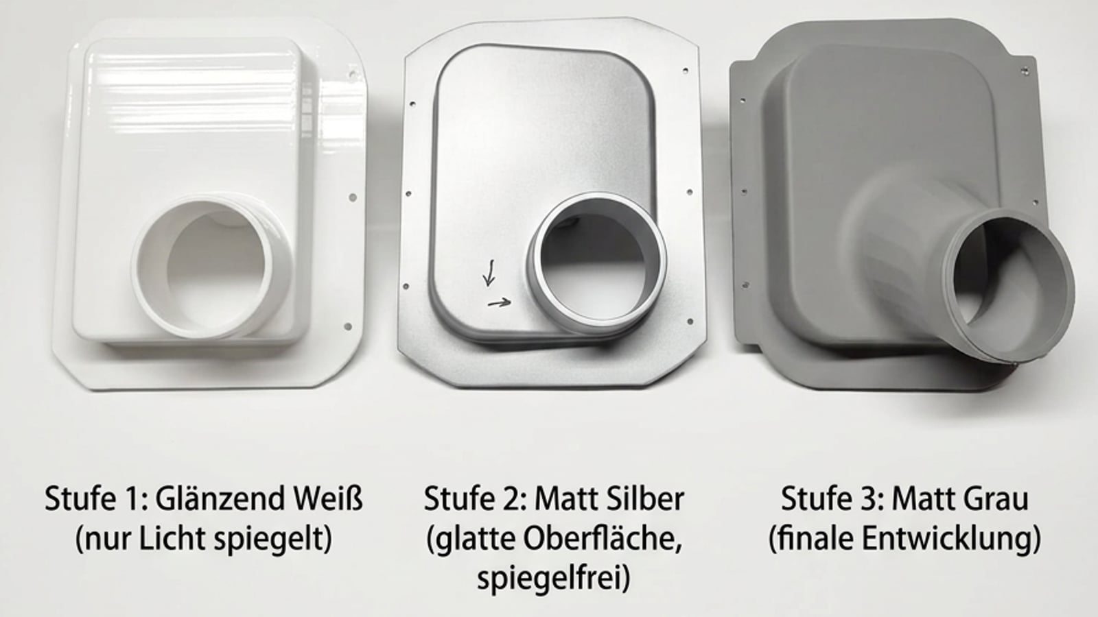 Airbox-Prototyp in drei Oberflächenstufen: glänzend weiß, matt silber und matt grau als finale Version